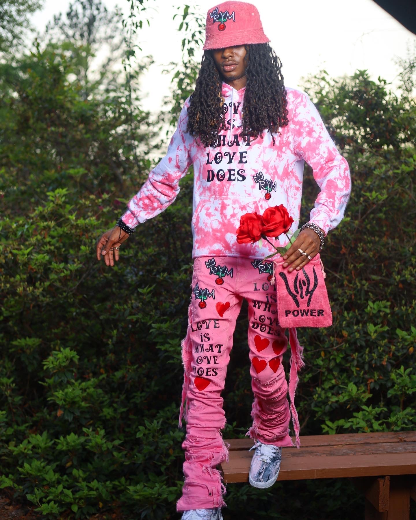 LOVE IS WHAT LOVE DOES PINK XAGGERATED DENIM