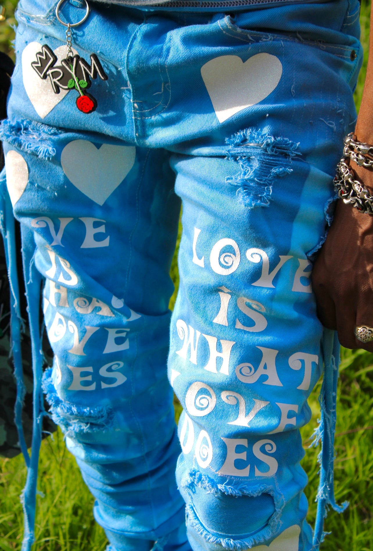 LOVE IS WHAT LOVE DOES BLUE XAGGERATED DENIM
